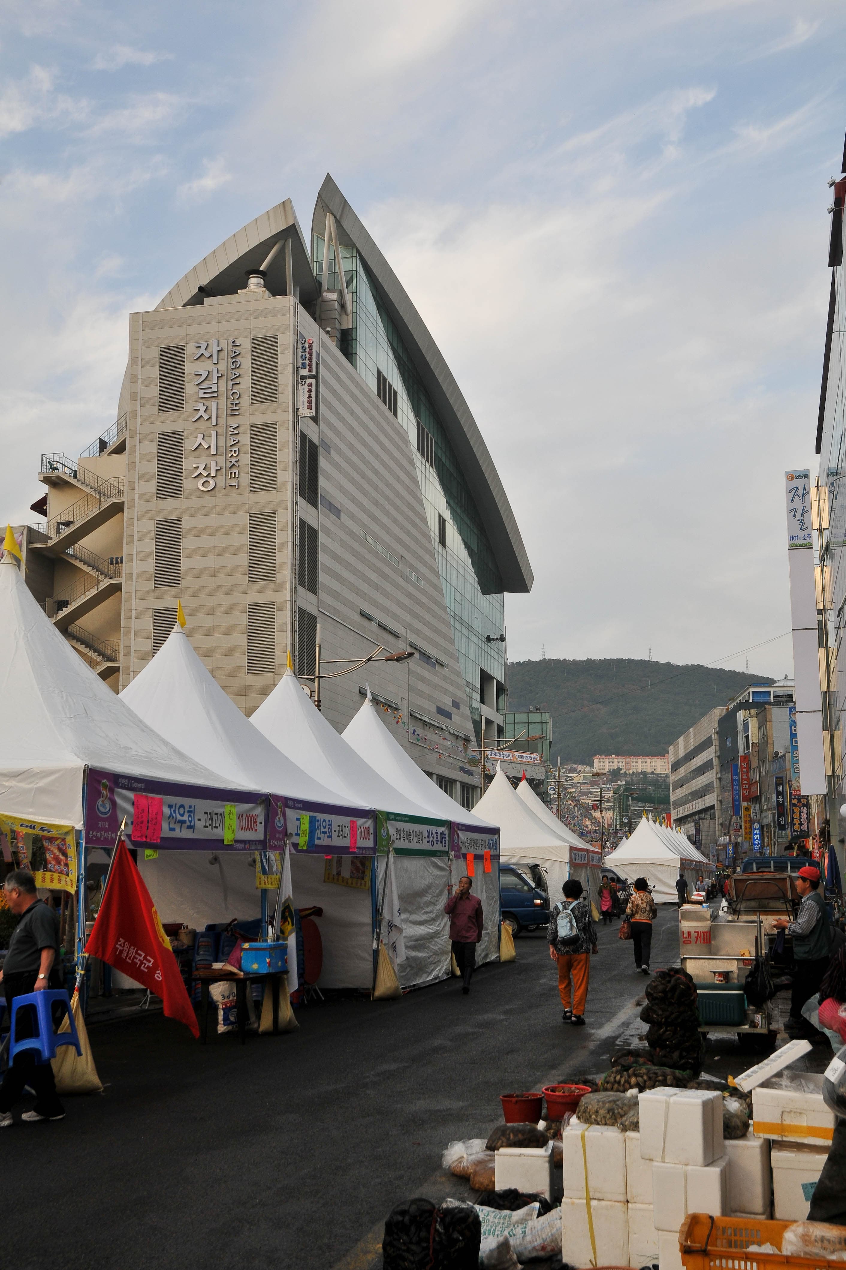Jagalchi Fish Market's building and market-tent stalls in the early morning