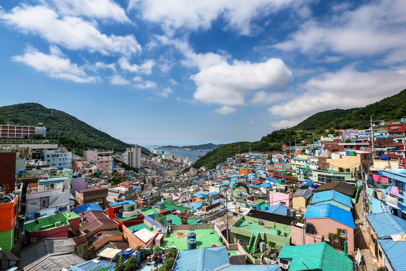 Colorful terraced homes of Gamcheon Culture Village overlooking the port