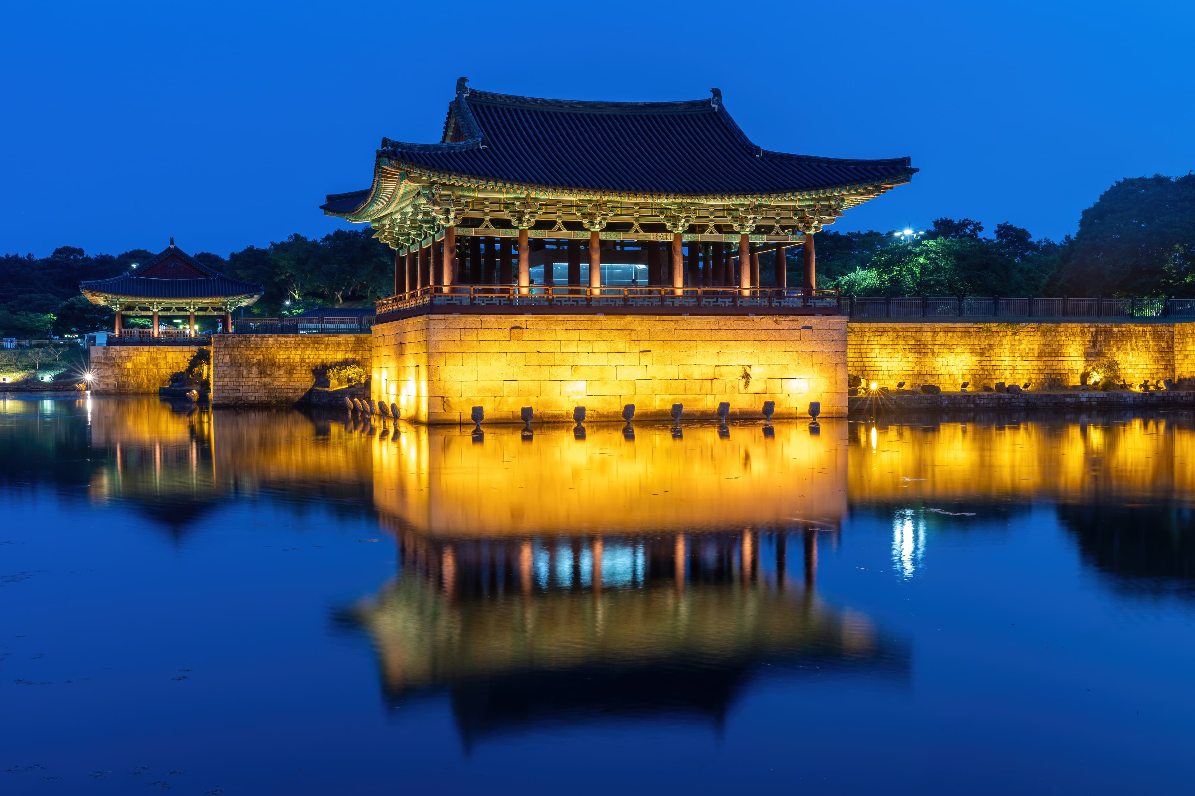 Donggung Palace and Wolji Pond at blue hour, the lit pavilion reflected on the water